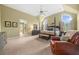 Spacious main bedroom featuring a sitting area, four-poster bed, and large windows for natural light at 2431 Valhalla Ne Dr, Atlanta, GA 30345