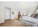 A bright bedroom boasts neutral walls, plush carpeting and comfortable sleeping area at 2431 Valhalla Ne Dr, Atlanta, GA 30345