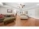 Cozy living room area featuring hardwood floors, recessed lighting, and easy access to other areas of the house at 2431 Valhalla Ne Dr, Atlanta, GA 30345