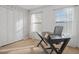 Bedroom with a closet, two sunny windows with blinds, and a carpeted floor to keep your feet warm at 2521 Capella Sw Cir, Atlanta, GA 30331