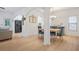 Open-concept home with view of dining area and kitchen, showcasing seamless flow at 2521 Capella Sw Cir, Atlanta, GA 30331
