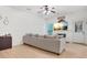 Cozy living room featuring a large TV above the fireplace and a comfortable sectional sofa at 2521 Capella Sw Cir, Atlanta, GA 30331