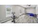 Basement showcasing an open area, plenty of natural light, and a walkout exit to a deck at 2615 Springmonte Pl, Cumming, GA 30041