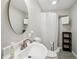 Neutral bathroom featuring a toilet, walk-in shower with curtain, vanity with a large mirror, and modern fixtures at 2615 Springmonte Pl, Cumming, GA 30041