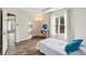 Bright bedroom with wood flooring and large window for natural light at 2615 Springmonte Pl, Cumming, GA 30041