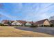 Large home boasts great curb appeal with a circular driveway at 2615 Springmonte Pl, Cumming, GA 30041