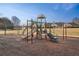 Have some fun at this community playground with swings, stairs, and slides; time to play! at 2615 Springmonte Pl, Cumming, GA 30041
