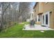 Well-maintained backyard with a patio, green grass, shade trees, and shed at 4831 Lake Park Ter, Acworth, GA 30101