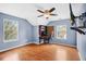 Versatile room with wood floors, natural light, and a built-in desk area at 4831 Lake Park Ter, Acworth, GA 30101