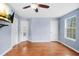 Spacious room featuring wood floors and abundant natural light at 4831 Lake Park Ter, Acworth, GA 30101