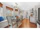 Modern kitchen with stainless appliances, a cozy breakfast nook, and hardwood floors throughout at 4831 Lake Park Ter, Acworth, GA 30101