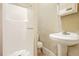 Bathroom features a shower stall and pedestal sink at 732 Cascade Ave, Atlanta, GA 30310