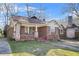 Charming brick bungalow with a covered porch and original architectural details at 732 Cascade Ave, Atlanta, GA 30310