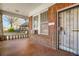 Charming front porch with brick facade and decorative ironwork at 732 Cascade Ave, Atlanta, GA 30310