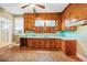 Eat-in kitchen with wooden cabinets at 732 Cascade Ave, Atlanta, GA 30310