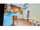 Traditional kitchen featuring wood cabinets, laminate countertops, and updated stainless steel appliances at 732 Cascade Ave, Atlanta, GA 30310