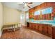 Kitchen featuring wood cabinets, retro counters and vinyl flooring at 732 Cascade Ave, Atlanta, GA 30310