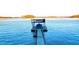 Boat dock with a boat lift located on the water at 5 Yachting Way, Acworth, GA 30102