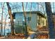 Charming lakeside cottage with a cozy porch and scenic surroundings at 5 Yachting Way, Acworth, GA 30102
