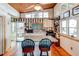 Bright and airy kitchen with an island and natural light, creating an inviting space for cooking and gathering at 5 Yachting Way, Acworth, GA 30102