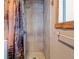 Updated bathroom showcases a tiled shower stall and sleek fixtures at 5 Yachting Way, Acworth, GA 30102