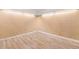 Partially finished basement corner featuring wood-look flooring, paneled walls, and white trim at 508 Greenridge Cir, Stone Mountain, GA 30083