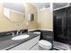 Bathroom featuring white vanity with granite countertop, toilet, and modern black tiled shower at 508 Greenridge Cir, Stone Mountain, GA 30083