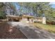 The house has a carport and long driveway to the side at 508 Greenridge Cir, Stone Mountain, GA 30083