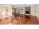 Spacious living room with hardwood floors and a brick fireplace at 508 Greenridge Cir, Stone Mountain, GA 30083
