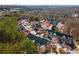 Aerial view of townhomes surrounded by lush greenery, offering a serene and private living environment at 612 Vinings Estates Se Dr # B12, Smyrna, GA 30126