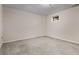 A carpeted basement with a single window providing natural light at 612 Vinings Estates Se Dr # B12, Smyrna, GA 30126