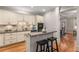 Bright kitchen featuring modern appliances and a breakfast bar with seating at 612 Vinings Estates Se Dr # B12, Smyrna, GA 30126
