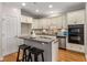 Spacious kitchen featuring a breakfast bar, stainless steel appliances, and ample storage at 612 Vinings Estates Se Dr # B12, Smyrna, GA 30126