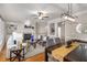 Cozy living space offering natural light and an open floor plan to dining area at 612 Vinings Estates Se Dr # B12, Smyrna, GA 30126