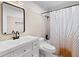 Bathroom featuring modern fixtures, decorative mirror, and shower at 1235 Woodland Ne Ave # 1, Atlanta, GA 30324