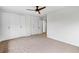 Bedroom with large closets, neutral carpet and a ceiling fan at 1235 Woodland Ne Ave # 1, Atlanta, GA 30324