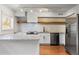 Well-appointed kitchen featuring stainless steel appliances, countertops, and modern fixtures at 1235 Woodland Ne Ave # 1, Atlanta, GA 30324