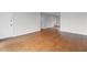 Spacious living room featuring hardwood floors and neutral wall colors at 1235 Woodland Ne Ave # 1, Atlanta, GA 30324