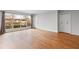Bright living room boasts hardwood floors, large windows, and a neutral color palette at 1235 Woodland Ne Ave # 1, Atlanta, GA 30324
