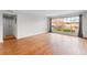 Inviting living room features hardwood floors, large windows providing ample natural light at 1235 Woodland Ne Ave # 1, Atlanta, GA 30324