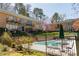 Exterior view featuring a pool, outdoor seating, and well-maintained landscaping at 1235 Woodland Ne Ave # 1, Atlanta, GA 30324