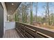 Wooden balcony with a view of the neighborhood at 1355 Lockwood Sw Dr, Atlanta, GA 30311