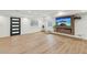 Bright living room featuring a modern fireplace and sleek design with lots of natural light at 1355 Lockwood Sw Dr, Atlanta, GA 30311