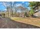 Expansive backyard featuring mature trees and an idyllic setting, perfect for outdoor enjoyment and relaxation at 20 Juniper Se Ln, Cartersville, GA 30121