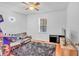Bedroom with a black rug, comfortable couch, and mounted television at 20 Juniper Se Ln, Cartersville, GA 30121