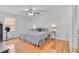 Bright bedroom with hardwood floors, a window, and ceiling fan at 20 Juniper Se Ln, Cartersville, GA 30121