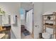 Clean bathroom offers neutral paint, a large mirror, and ample storage at 1258 Dekalb Ne Ave # 129, Atlanta, GA 30307