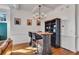 Bright dining area with sleek black bar stools and a rustic wood table at 1258 Dekalb Ne Ave # 129, Atlanta, GA 30307