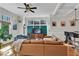 Cozy living room with a large TV, stylish furniture, and easy access to the kitchen and dining area at 1258 Dekalb Ne Ave # 129, Atlanta, GA 30307