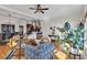 Open living area with hardwood floors, a comfortable sofa, and stylish furnishings next to the kitchen at 1258 Dekalb Ne Ave # 129, Atlanta, GA 30307